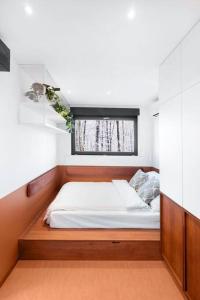 Giường trong phòng chung tại Good Spot Zieleniec Comfort Eco