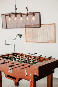 a ping pong table with a chessboard at Lamego Hotel & Life in Lamego