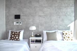 Postel nebo postele na pokoji v ubytování 라비앙즈-Raviens-Elliy's Room