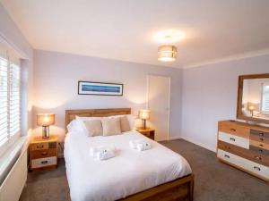 Tempat tidur dalam kamar di Pass the Keys Tynemouth Your Home Away From Home