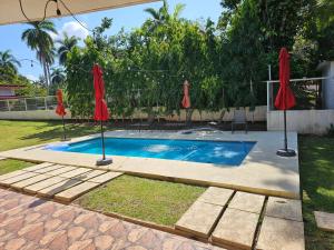 Bazén v ubytování oasis with pool near Panama Canal nebo v jeho okolí