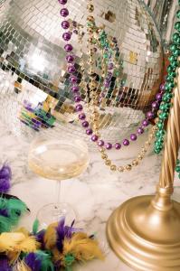 a glass plate with a necklace on a table at Virgin Hotels New Orleans in New Orleans