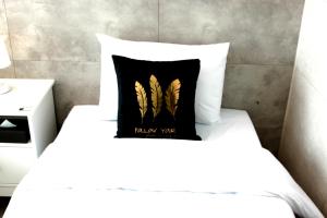 Postel nebo postele na pokoji v ubytování 라비앙즈-Raviens-Elliy's Room