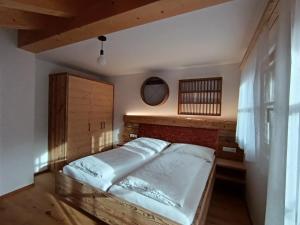 Ένα ή περισσότερα κρεβάτια σε δωμάτιο στο Innerraderhof Appartment 3