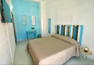 Postel nebo postele na pokoji v ubytování Nonna Ita