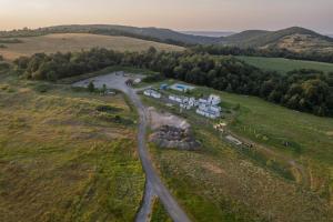 an aerial view of a house in the middle of a field at Mountain Sky View - Маунтин Скай Вю in Gabrovo