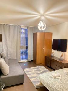 Телевизор и/или развлекательный центр в HALBY rooms in the very CENTER of Warsaw