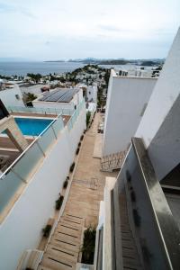 a view from the roof of a building with a swimming pool at Ilya Apart 1 in Bodrum City