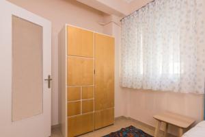 Ένα ή περισσότερα κρεβάτια σε δωμάτιο στο Three Bedrooms Apt in Kallithea