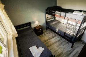 an overhead view of a bedroom with two bunk beds at Etels House - Departamentos Mina Clavero in Mina Clavero