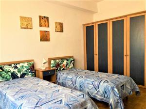 Ένα ή περισσότερα κρεβάτια σε δωμάτιο στο CILENTO VILLA PANORAMICA PISCINA PRIVATA 8 PERSONE +28 φωτογραφίες