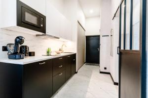 Nhà bếp/bếp nhỏ tại Apartament UKIEL PARK 40 przy Plaży Miejskiej - klimatyzacja,free parking,FV