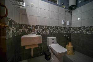 Koupelna v ubytování Mukhil Paradise Villa