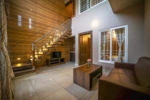 Istumisnurk majutusasutuses Mukhil Paradise Villa