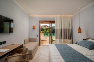 Postel nebo postele na pokoji v ubytování Hotel Sestante + 19 fotografií