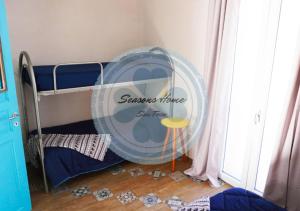 A bed or beds in a room at Seasons Home San Foca