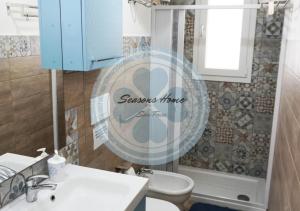 A bathroom at Seasons Home San Foca