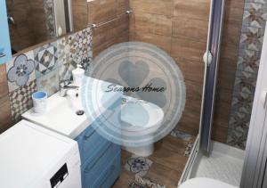 A bathroom at Seasons Home San Foca