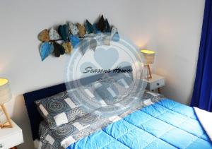 A bed or beds in a room at Seasons Home San Foca