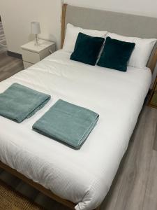 En eller flere senge i et værelse på En-suite room