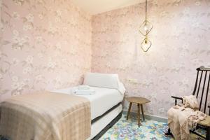Posteľ alebo postele v izbe v ubytovaní Luderna - Apartamento con terraza Bonaigua B1 Joanchiquet