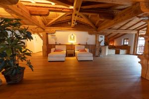 Posteľ alebo postele v izbe v ubytovaní Dorfhotel Beludei