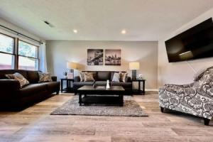 a living room with a couch and a coffee table at Remodeled 2 BDRM Ranch Attached Home Liberty, TWP in Rockdale