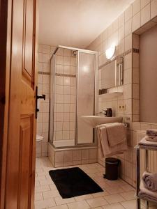a bathroom with a shower and a sink at Haus Gstrein in Oetz