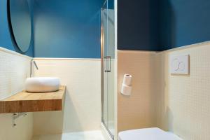 Ванна кімната в Rdr Tortona Rooms