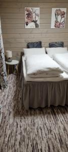 מיטה או מיטות בחדר ב-Sydalen house