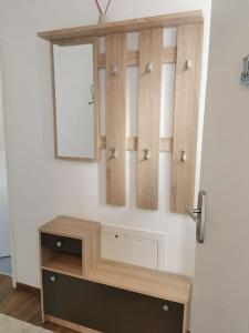a dressing room with a mirror and a dresser at Cooldog Mini in Imst