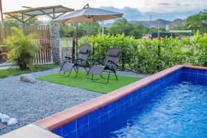 Bazén v ubytování Cabaña Familiar/La jagua Huila/Piscina y BBQ nebo v jeho okolí