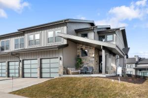 an image of a house with a garage at Luxury Stays Club 1012, New lovely 4br TH, New Deer Valley 1 min Park City 10 min in Heber City