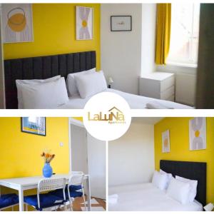 a room with a bed and a table and a yellow wall at Great offers on Long Stays!! LaLuNa Apartments in Gateshead
