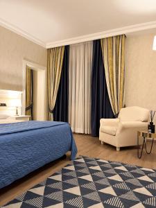 Postel nebo postele na pokoji v ubytování Hotel Poppi