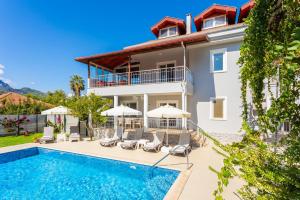 Πισίνα στο ή κοντά στο Daisy Villa