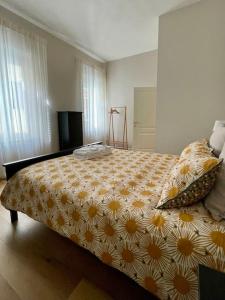 Krevet ili kreveti u jedinici u okviru objekta Appartamento con terrazza e parcheggio privato