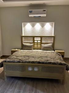 Posteľ alebo postele v izbe v ubytovaní Park View Residency