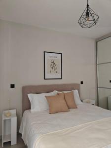 Orchidea Flat客房内的一张或多张床位