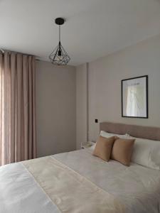 Orchidea Flat客房内的一张或多张床位
