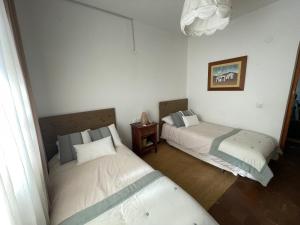 Posteľ alebo postele v izbe v ubytovaní Villa Marver