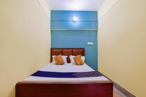 Krevet ili kreveti u jedinici u okviru objekta SPOT ON Luv-kush Inn