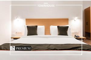 Llit o llits en una habitació de Townhouse 173 Knowledge Park 3 Near PVR Ansal Plaza Greater Noida