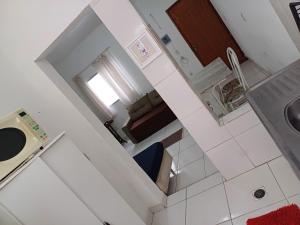 an overhead view of a kitchen and living room at Flat Itavuvu in Sorocaba