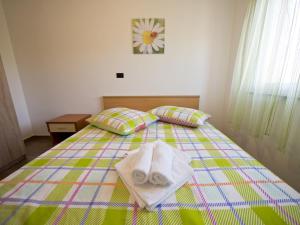 Postel nebo postele na pokoji v ubytování Apartment Bamba + 36 fotografií