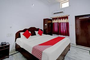 Krevet ili kreveti u jedinici u objektu Flagship Dinesh Home Stay