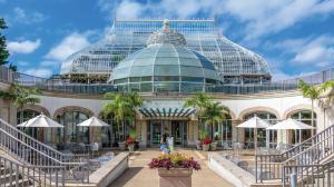 a building with a glass dome on top of it at Rivertown Retreat in Downtown Verona in Verona