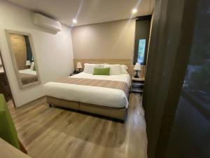 Postelja oz. postelje v sobi nastanitve EcoHub Hotel Medellin