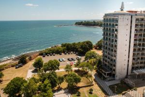 an aerial view of a building next to the ocean at Hotel Kremikovci in Kiten