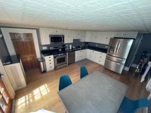 an overhead view of a kitchen with a table and appliances at Stupendous Apartment Steps From the Capitol! in Washington